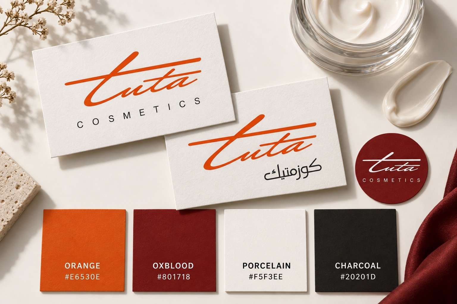 Proposed Tuta Cosmetics palette with orange, oxblood, porcelain and charcoal swatches.