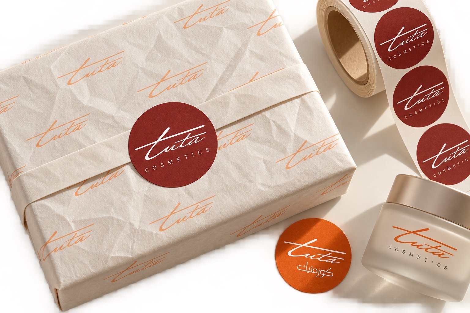 Tuta Cosmetics seal stickers and branded tissue paper for cosmetic packaging.
